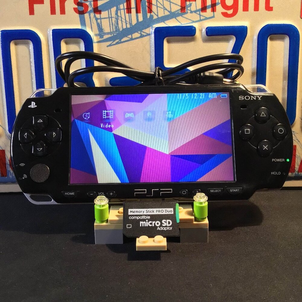 Sony PSP 2001 with Charger, Memory Stick, & Games